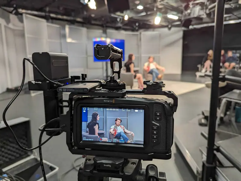 Camera monitor framing a studio talk set